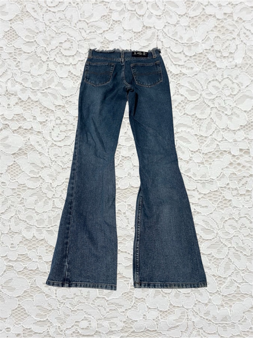vintage lei frayed waistband dark wash low rise flare jeans
